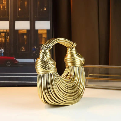 Kamilian | Sculpted Noodle-Shaped Bags