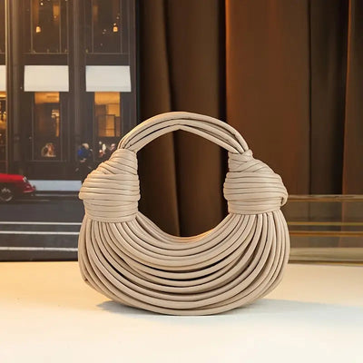 Kamilian | Sculpted Noodle-Shaped Bags